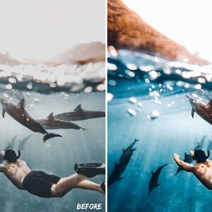 May include: A person swims underwater with a group of dolphins. The water is clear and blue, and the sun is shining brightly. The dolphins are swimming in a circle around the person.