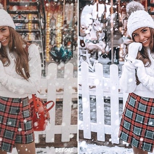 May include: A woman wearing a white knit sweater, a red and green plaid skirt, a white knit hat with a fluffy pom pom, and white gloves. She is standing in front of a white picket fence with snow falling around her.