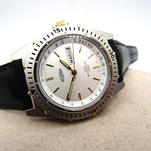 vintage Belle rare montre à quartz Medana tachymétrique avec lunette tournante en excellent état cosmétique et de travail !!!