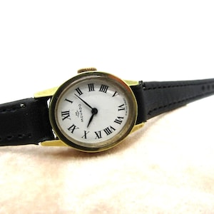 Vintage Beautiful Ladies Rare Movado Factories Swiss Watch w/ Roman Numeral Markers and GP Bezel in Great Cosmetic & Working Condition!!!