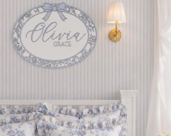 Coquette Wooden Name Sign: Blue bow and Chinoiserie Grand Millennial toile du jouy inspired Nursery Decor, Baby Name oval board blue & white