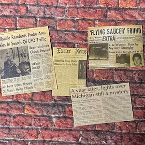 4 pc Alien / UFO Newspaper Clippings - this is not life size.