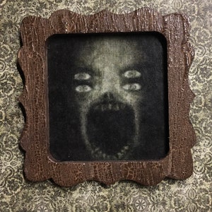 Retiring - Aged Framed Creepy Freak - this is not life size.