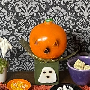 On SALE - 1 pc Vintage (60s-70s) Pumpkin Head with Ghost Decoration - this is not life size. Sold as is. Was 10.00.