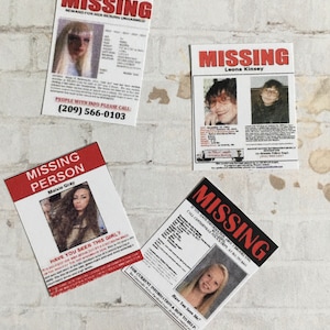 May include: Three missing person posters with photos and contact information. The posters are printed on white paper with red text and are taped to a white brick wall.