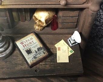 Ratty Old Book - Witch Hunt (books are not made to open.) Approx 1”  - this is NOT life size.