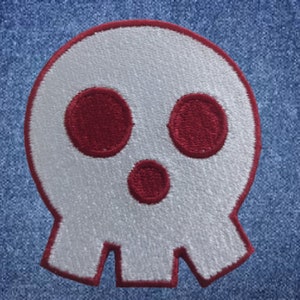 May include: White skull patch with red embroidered eyes and mouth. The skull is outlined in red.