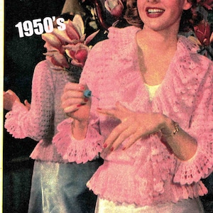 May include: A vintage crochet pattern for a pink cardigan with a ruffled neckline and sleeves. The pattern is titled "1950's 3 Ply Crochet Shell Patt".