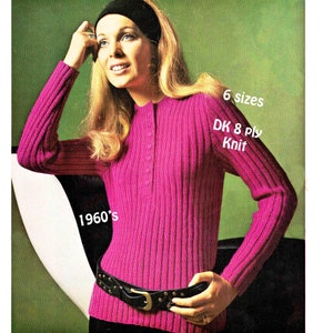 May include: A pink knitted sweater with a button-up collar and long sleeves. The sweater is being modeled by a woman with long blonde hair and a black headband. The text "1960's", "6 sizes", and "DK 8 Ply Knit" is visible on the image.