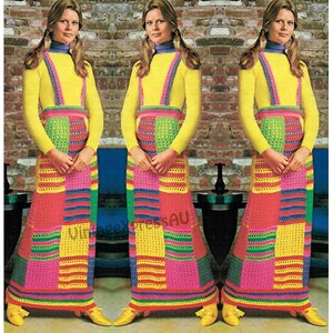 May include: A crochet skirt pattern featuring a colorful patchwork design with a yellow, pink, green, blue, and red color scheme. The skirt is long and flowing, with a wide waistband and a simple design.