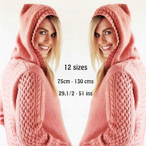 May include: A coral-coloured hooded sweater with cable knit detailing on the sleeves. The sweater has a relaxed fit and is shown on a person. The image includes the text "12 sizes", "75cm - 130 cms", and "29.1/2 - 51 ins".