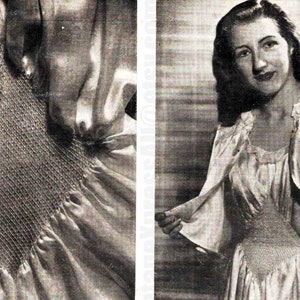 May include: A close-up of a white satin dress with a crocheted bodice. The dress is being held open to show the crocheted detail.