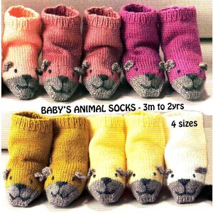 May include: Ten pairs of knit socks in various colors including peach, pink, magenta, yellow, and white, each featuring a grey animal face design on the toe. The text BABY'S ANIMAL SOCKS - 3m to 2yrs and 4 sizes is printed in the center of the image.