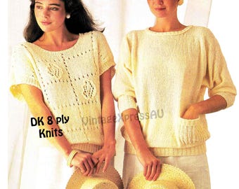 May include: Two women wearing knitted sweaters. The sweater on the left is a short-sleeved, lacy design. The sweater on the right is a long-sleeved, solid design with a pocket. Both sweaters are cream colored. The text "DK 8 ply Knits" is visible in the image.