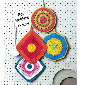 May include: Four handmade crochet pot holders in various geometric shapes and vibrant colors including pink, lime green, orange, yellow, blue, and white. The text Pot Holders Crochet is printed in black on the left side of the display.