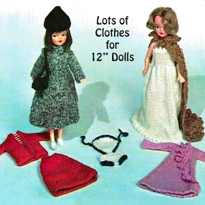 May include: A collection of knitted doll clothes for 12" dolls. The set includes a long white dress with a brown cape, a grey coat with a black bag, a red sweater and skirt, a purple dress with a ruffle, and a white and black swimsuit.