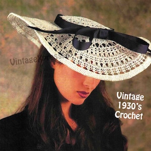 May include: Vintage 1930's crochet hat pattern. The hat is white with a black ribbon and bow. The pattern is for a wide-brimmed hat with a delicate lace design.