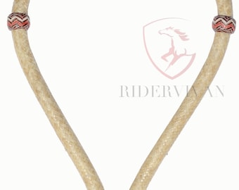 May include: A braided leather horse halter with a red and white chevron pattern. The halter has a single knot at the bottom.