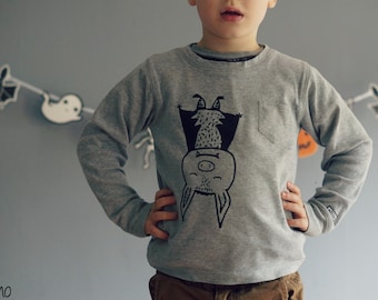 May include: A gray sweatshirt with a black and white illustration of a bat hanging upside down. The bat has a smiling face and a small nose.
