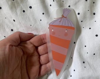 May include: A purple and orange cartoon carrot with a smiling face and a purple hat. The carrot is on a white background with black dots.