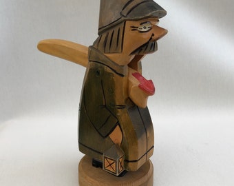 Whimsical wooden nutcracker night watchman carved by hand