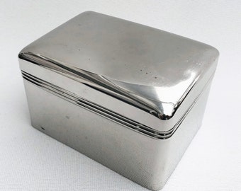 Silver shiny mirrored metal box, metal box, hinged lid