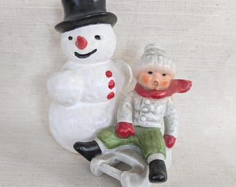 Vintage snowman and sledder boy on sled Goebel winter decoration porcelain winter snow Christmas decoration Christmas