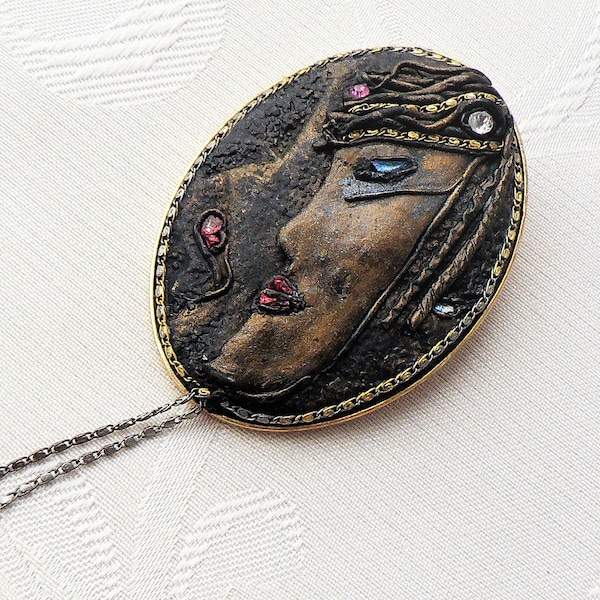 Oval Fimo brooch with rhinestones 70s face in profile costume jewelry