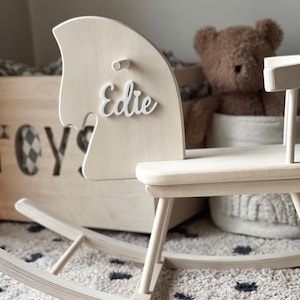 Personalised Wooden Rocking Horse. Safe for all ages 18 month and up. Features a comfortable riding seat that will make your child have a feel of thrilling riding and have long hours of fun.