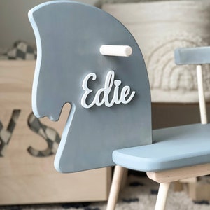 Personalised Wooden Rocking Horse painted in grey colour. Safe for all ages 18 month and up. Features a comfortable riding seat that will make your child have a feel of thrilling riding and have long hours of fun.