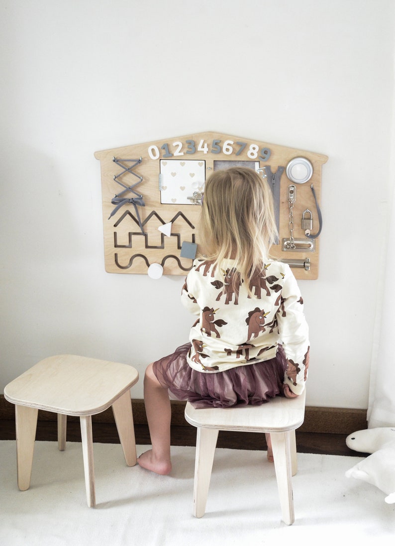 Lovely wooden Busy Board with the name.
Children learn quickly through open play by touching and exploring various objects.
A busy board stimulates learning through experiments.