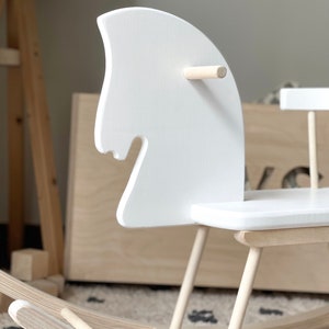 Personalised Wooden Rocking Horse painted in white colour - the perfect swing-toy to develop fine and gross motor skills.