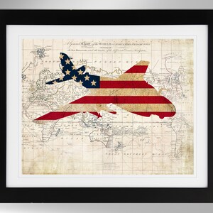 May include: A vintage world map with an American flag superimposed over it in the shape of a jet aircraft. The map is faded and has a distressed look, giving it a vintage feel.