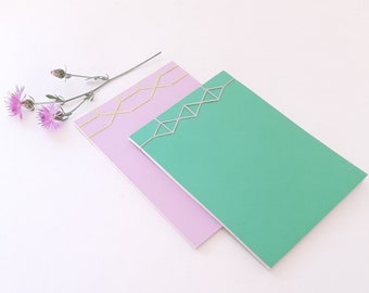 Japanese notebooks in green or lilac, handmade A5 notebooks with recycled paper and Japanese binding, minimal style notepad