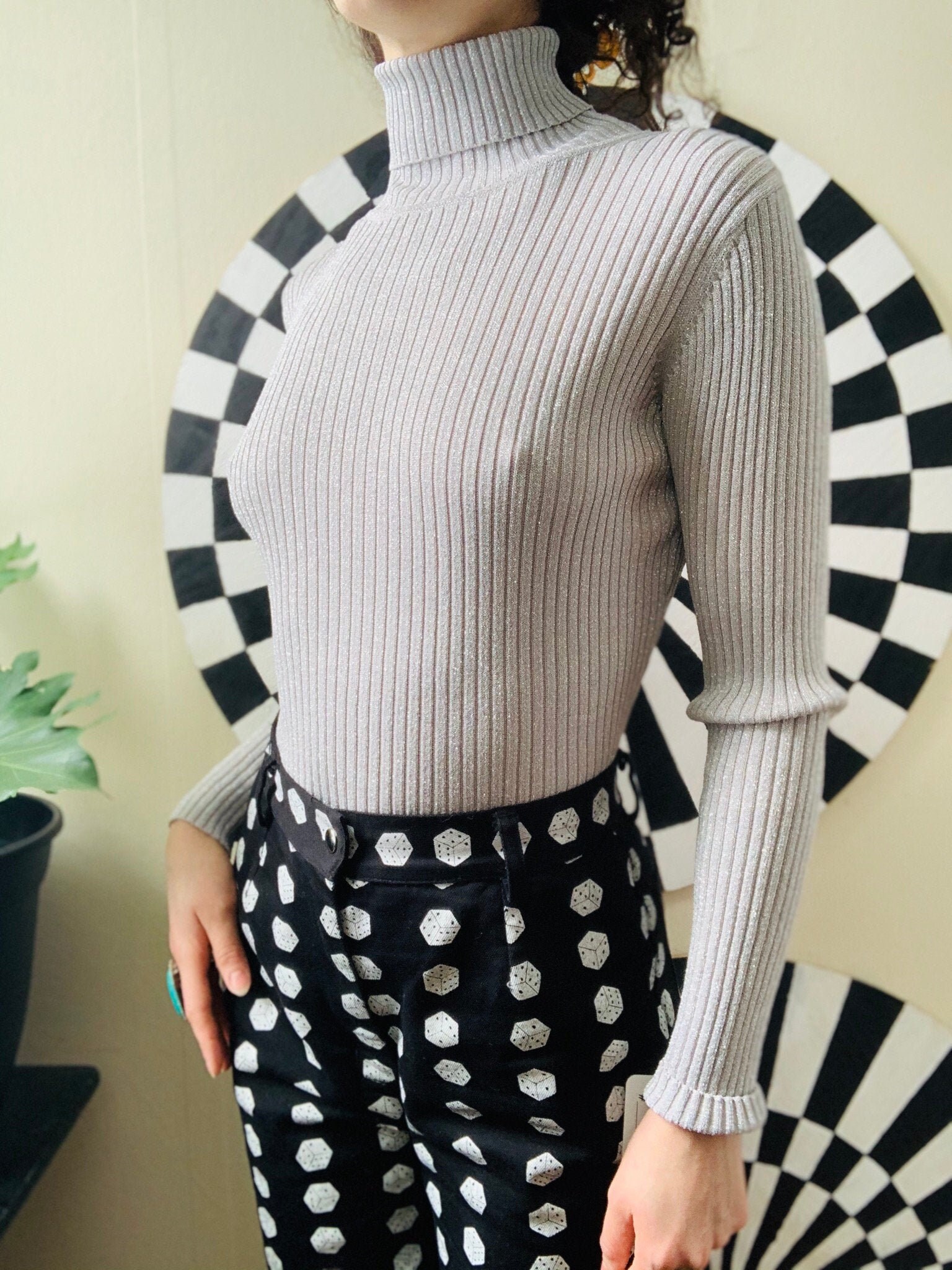 silver turtleneck sweater