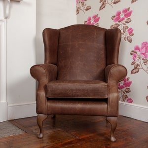 Chesterfield Wing Back Armchair Presented In Vintage Brown 100% Leather Hand made in the UK