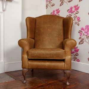 Chesterfield Wing Back Armchair Presented In Vintage Tan 100% Leather Hand made in the UK