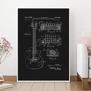 May include: A black and white illustration of a guitar patent drawing. The drawing shows a detailed view of the guitar's body, bridge, and tailpiece. The patent number is 2,714,326 and the inventor's name is T.M. Micarty. The patent was filed on 21 January 1953 and granted on 2 August 1955.