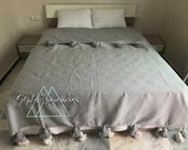 moroccan pom pom blanket, Gray handwoven pom pom blanket