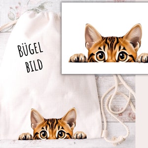 Iron-on patch curious cat, Bengal cat, iron-on patch for cat moms and dads, cat looks over the edge of the table with paws, SKU 5.000.407