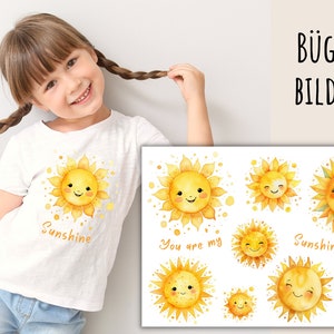 Può includere: Toppe termoadesive con simpatici soli sorridenti con dettagli ad acquerello gialli e arancioni. Le toppe dicono "Sunshine" e "You are my Sunshine".