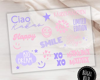 15 parches termoadhesivos en rosa pálido y lila claro, con frases divertidas para estampar, ideales para chicas: traviesas, ciao cacao, feliz, sonrisa.