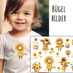 May include: A white t-shirt with a cute sunflower character iron-on design. The design features a smiling sunflower with a yellow face and brown eyes. The shirt is being modelled by a child. The image also includes a sheet of iron-on designs featuring sunflowers, wreaths, and other sunflower-themed characters. The text "Bügel Bilder" is visible in the image.