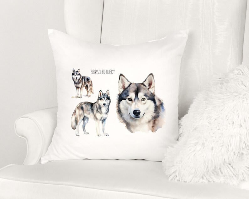 May include: White pillow with a watercolor illustration of three Siberian Huskies. The text "Siberian Husky" is printed on the pillow.