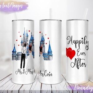 May include: Two stainless steel tumblers with a white background. One tumbler features a watercolor illustration of a couple in front of a blue castle with red hearts. The text "Mr. & Mrs." is below the image. The other tumbler features a watercolor illustration of a castle with red hearts and the text "Happily Ever After".