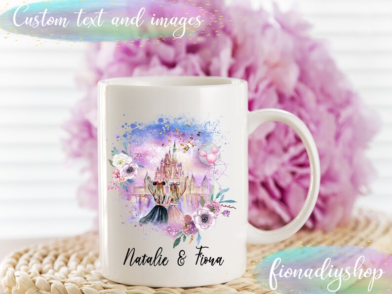 May include: White ceramic mug featuring a watercolor design with a castle, two figures, and floral accents. The mug has the text "Natalie & Fiona" and "Custom text and images". The mug is a standard size and has a curved handle.
