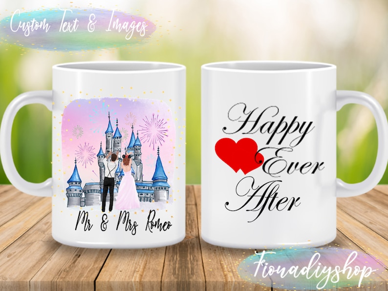May include: White ceramic mug with a pink and purple castle illustration and the text "Mr. & Mrs. Romeo" on one side. The other side has a red heart and the text "Happy Ever After".