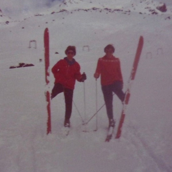 Skis Up - Two Woman On The Slopes Color Snapshot Photo - 1970's