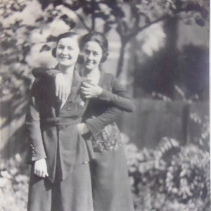 Stunning Young Woman With Beautiful Smile And Her Mother Pose In The Park Snapshot Photo - 1918