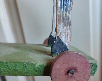 アンティークのおもちゃの馬、木馬、車輪付きの引き馬、歴史的、本物の